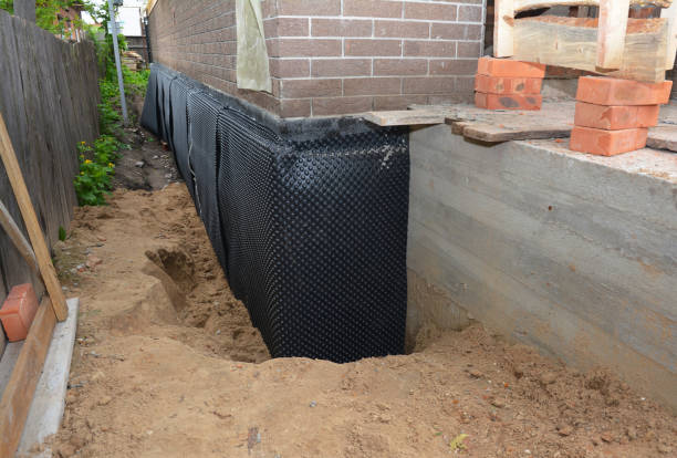 Happy homeowners after waterproofing job in Kent
